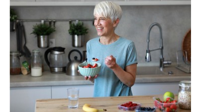 Woman enjoying a balanced sports nutrition meal