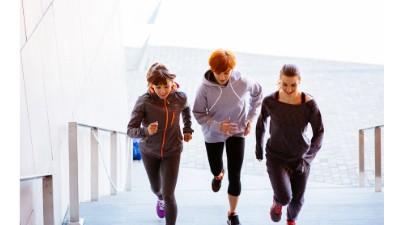 Women running stairs during a conditioning session